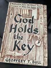 God Holds the Key (Used Copy)